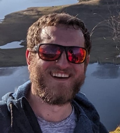 Liam smiling at the camera